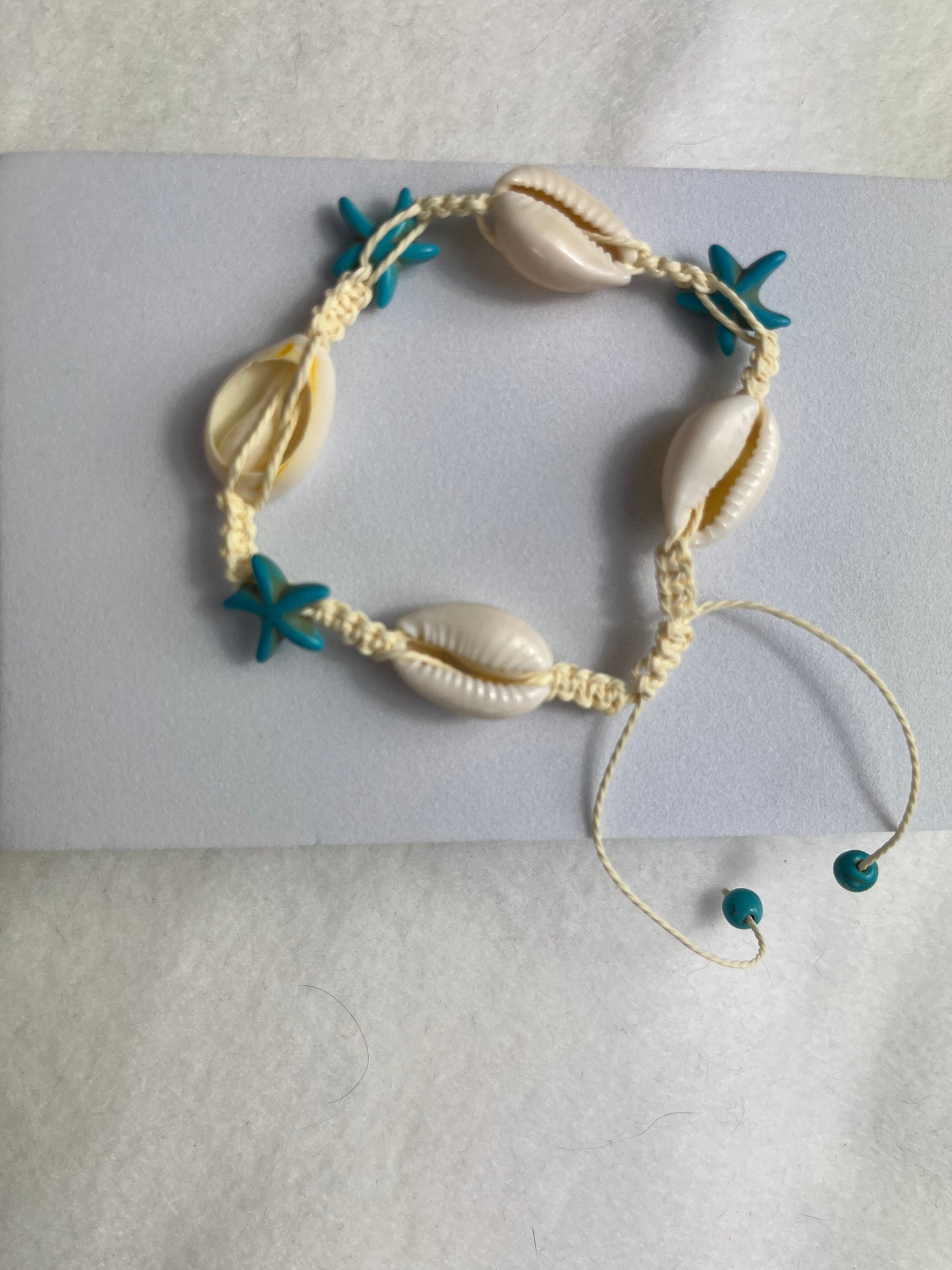 Bracelet de cheville coquillage corde